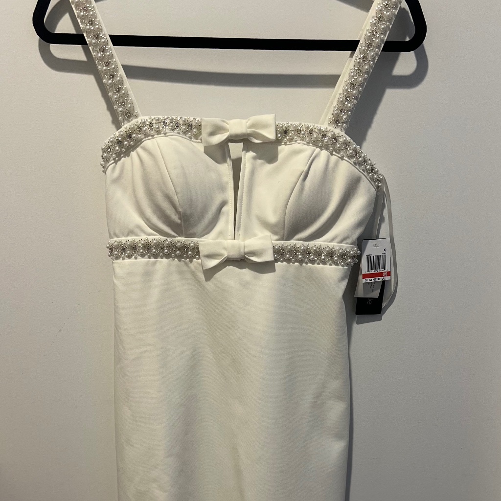 White Cocktail Dress With Beaded Embellishment And Bow Details